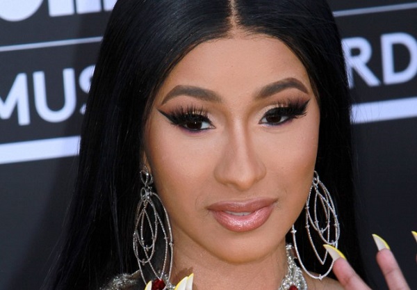 Cardi B Showed Off A Louis Vuitton-Imprinted Ponytail On Instagram