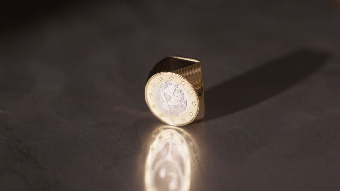 Belgian Bank Designs The First ThreeSided Coin To Put Its Money On The Earth